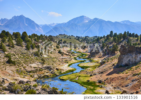 Hot Creek River Winding Through Geothermal Valley with Sierra Nevada Mountains Hot Creek River Winding Through Geothermal Valley with Sierra Nevada Mountains 133901516
