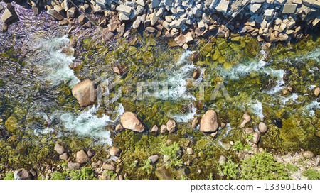 Aerial Merced River Flowing Over Boulders and Stone Embankment Top Down Aerial Merced River Flowing Over Boulders and Stone Embankment Top Down 133901640