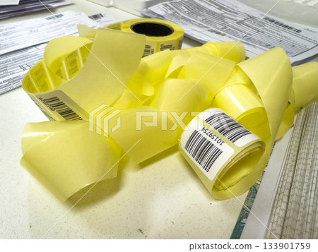 Barcode Labels Ready, Shipping Preparation With Thermal Barcode Stickers And Scanning Equipment Barcode Labels Ready, Shipping Preparation With Thermal Barcode Stickers And Scanning Equipment 133901759