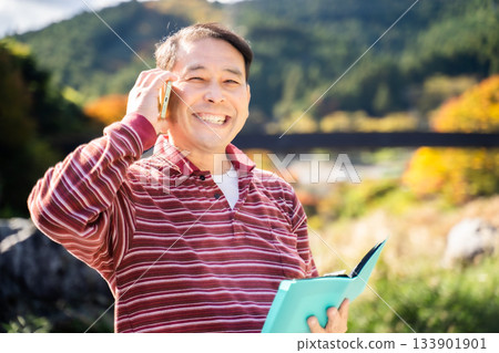 A man calling on a smartphone A man calling on a smartphone 133901901