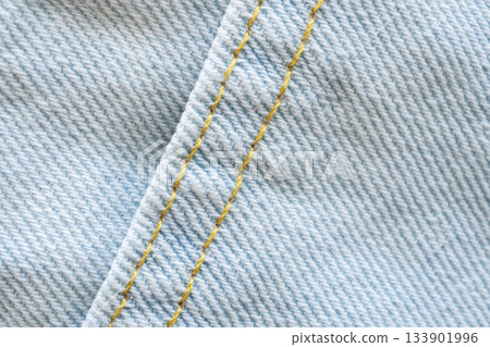 Old denim blue jeans fabric texture background close up 133901996