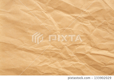 Abstract crumpled and creased recycle brown paper texture background Abstract crumpled and creased recycle brown paper texture background 133902029