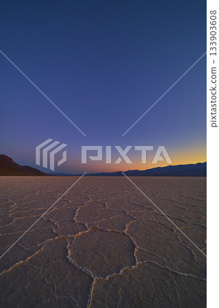 Salt Flats Pattern at Twilight in Badwater Basin Death Valley Desert Landscape Salt Flats Pattern at Twilight in Badwater Basin Death Valley Desert Landscape 133903608