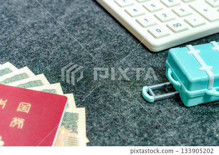Travel image showing passport and money needed for travel preparation Travel image showing passport and money needed for travel preparation 133905202