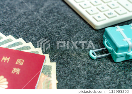 Travel image showing passport and money needed for travel preparation Travel image showing passport and money needed for travel preparation 133905203