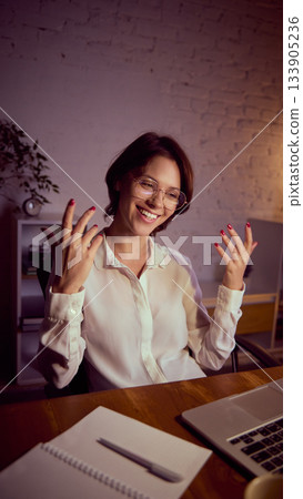 Woman expressing emotions during online coaching at learning session Woman expressing emotions during online coaching at learning session 133905236