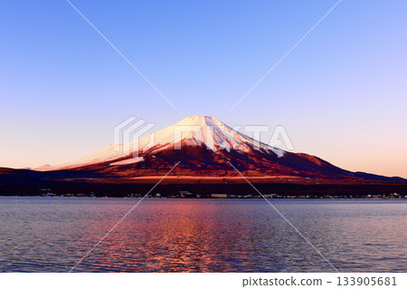 Red Fuji in the early morning New Year's Day as seen from Lake Kawaguchi Red Fuji in the early morning New Year's Day as seen from Lake Kawaguchi 133905681