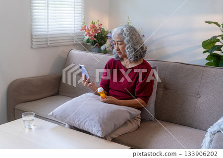 Elderly Woman Searching for Medicine Detail Elderly Woman Searching for Medicine Detail 133906202