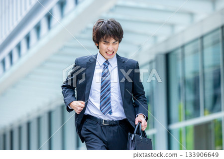 Running businessman 133906649