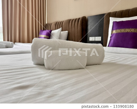 Clean towels of various sizes are rolled up Clean towels of various sizes are rolled up 133908180