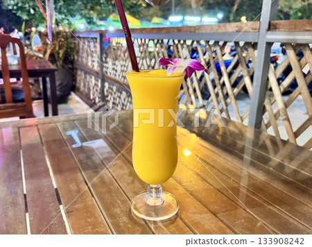 delicious chilled mango fresh is on the table in a cafe in Asia 133908242