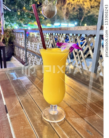 delicious chilled mango fresh is on the table in a cafe in Asia delicious chilled mango fresh is on the table in a cafe in Asia 133908243