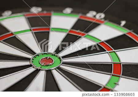 Close-up of a Classic Bristle Dartboard, Business and sport concept, target accuracy concept, perfect accuracy. High quality photo 133908603