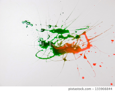 Paint Aftermath With Green And Red Spread Across White Surface, Blended Edges And Scattered Droplets Create 133908844