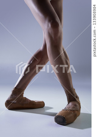 Ballet legs in relaxed crossed stance with emotional softness and balance Ballet legs in relaxed crossed stance with emotional softness and balance 133908984
