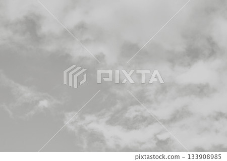Cloud dancer toned sky and clouds. Monochrome background 2026 color of the year. Cloud dancer toned sky and clouds. Monochrome background 2026 color of the year. 133908985