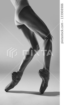 Black and white ballet leg movement study on pointe with emotional precision Black and white ballet leg movement study on pointe with emotional precision 133908986