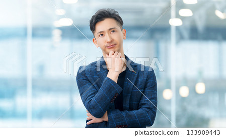 A male businessman thinking 133909443
