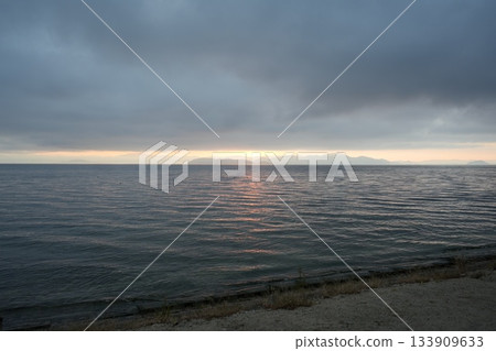 Spectacular sunrise at Tsukimihama Beach in Shiga Prefecture Spectacular sunrise at Tsukimihama Beach in Shiga Prefecture 133909633