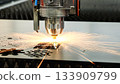 Modern metalworking plant CNC milling machine. Processing and laser cutting for metal in the industrial. Motion blur. Industrial exhibition of machine tools. 133909799