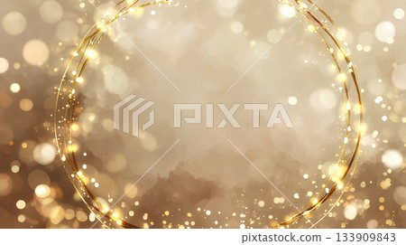 A gold ring frame with a soft, shining blur 133909843