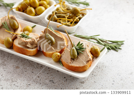 Sandwiches with homemade liver pate. 133909911