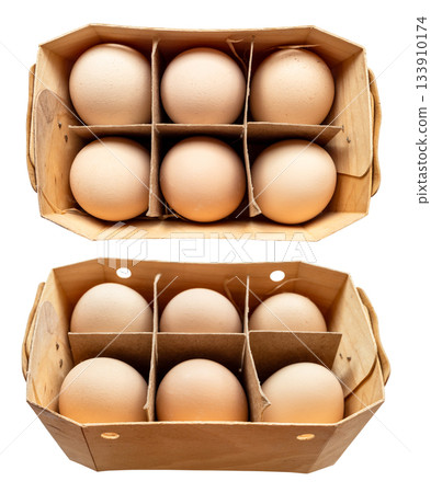 set of brown chicken eggs in plywood box cutout 133910174