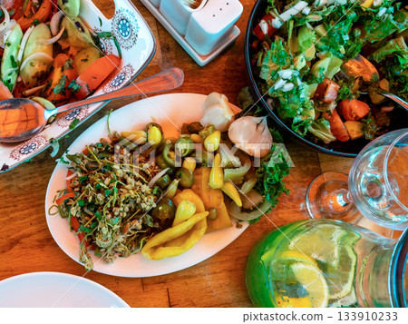 top view of traditional Georgian pickles and salad 133910233
