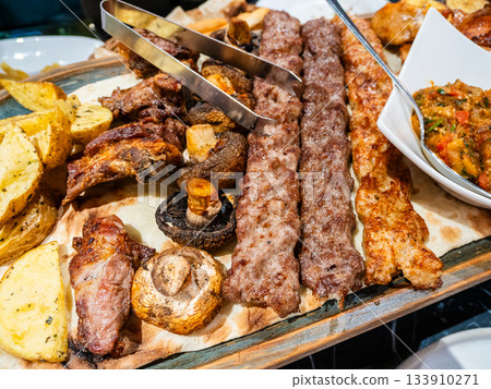 Armenian kebabs on plate with meat assortment Armenian kebabs on plate with meat assortment 133910271