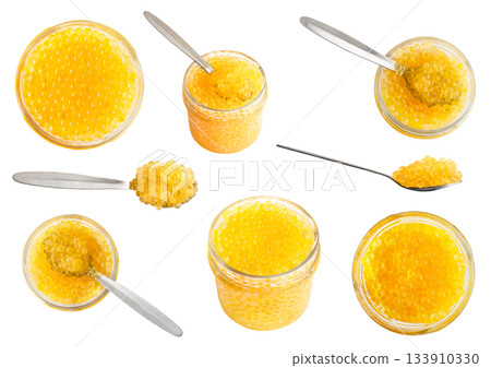 yellow caviar of trout fish in can and spoons yellow caviar of trout fish in can and spoons 133910330