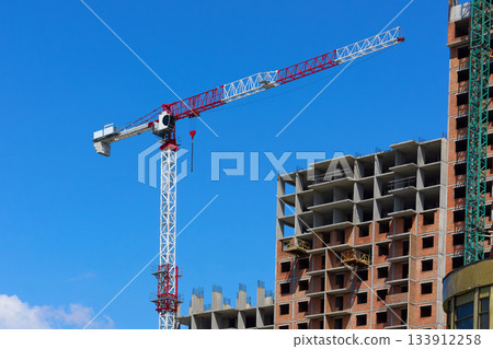 Large high rise crane on construction new building Large high rise crane on construction new building 133912258