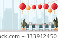 Bright office space featuring a long desk with computers, decorated with traditional Chinese lanterns and plants, creating an inviting atmosphere 133912450