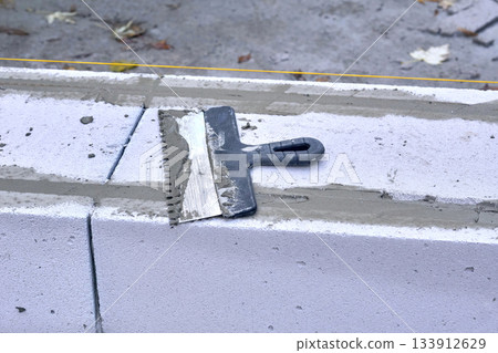 Trowel for laying cement mortar on aerated concrete and expanded clay blocks Trowel for laying cement mortar on aerated concrete and expanded clay blocks 133912629