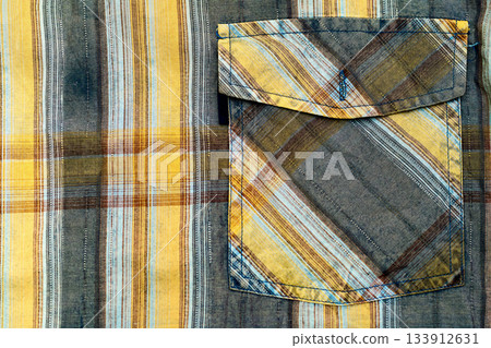 Pocket on gray yellow blue plaid shirt, hide something Pocket on gray yellow blue plaid shirt, hide something 133912631