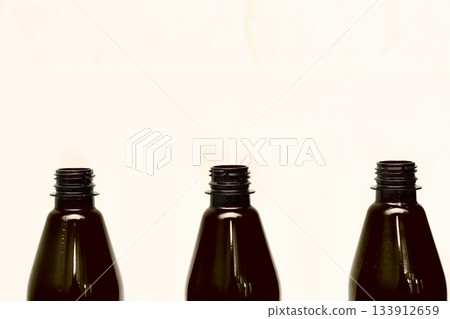 Three opened plastic bottles for beer,kvass,lemonade,ale,malt Three opened plastic bottles for beer,kvass,lemonade,ale,malt 133912659