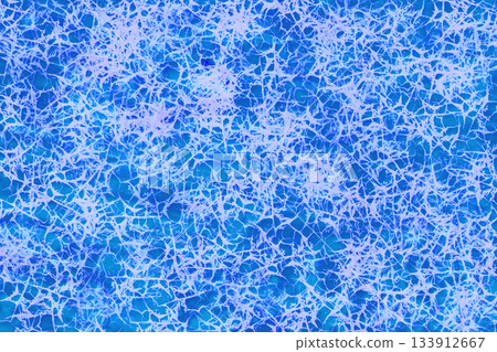 Abstract white icy spider web frost on blue azure Abstract white icy spider web frost on blue azure 133912667