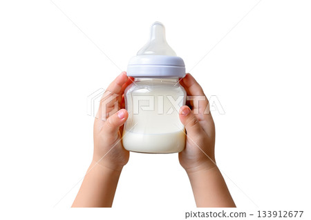 Baby's hands grasping baby bottle full of milk, isolated on transparent background for parenting and infant care designs 133912677
