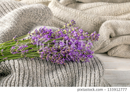 Charming lavender bouquet set on warm, textured knitted textiles Charming lavender bouquet set on warm, textured knitted textiles 133912777