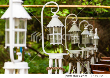 Beautiful white lanterns lined up in a row 133913499