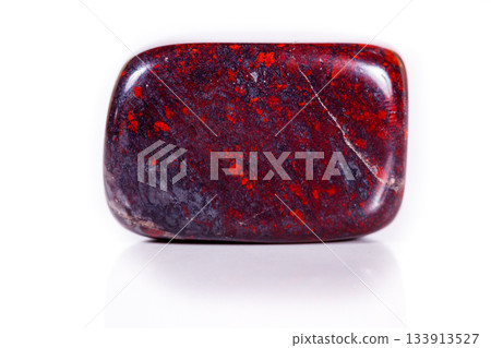 Macro mineral stone jasper hematite on white background Macro mineral stone jasper hematite on white background 133913527