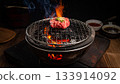 Grilling Wagyu Beef on Japanese BBQ Grill with Flames 133914092