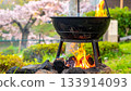 Outdoor Fire Pit Burning with Flames and Smoke 133914093