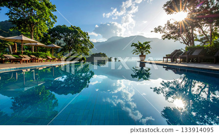 Infinity Pool Overlooking Mountains at Luxury Resort 133914095