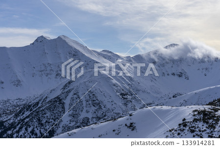 Snow-capped peaks of the Western Tatras in winter. Snow-capped peaks of the Western Tatras in winter. 133914281