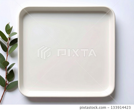 Kitchen equipment. Ceramic tray isolated on white background. Serving plate. Classic beige design. Top view. Kitchen equipment. Ceramic tray isolated on white background. Serving plate. Classic beige design. Top view. 133914423