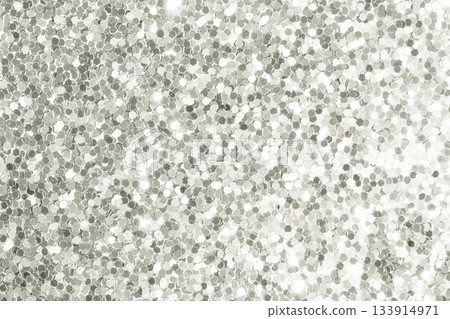 Silver glitter creating sparkling abstract texture background. Color of 2026 year dancer in the white cloud Silver glitter creating sparkling abstract texture background. Color of 2026 year dancer in the white cloud 133914971
