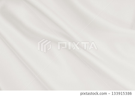 Smooth elegant golden silk or satin luxury cloth texture as wedding background. Luxurious background design. In Sepia toned. Retro style Smooth elegant golden silk or satin luxury cloth texture as wedding background. Luxurious background design. In Sepia toned. Retro style 133915386