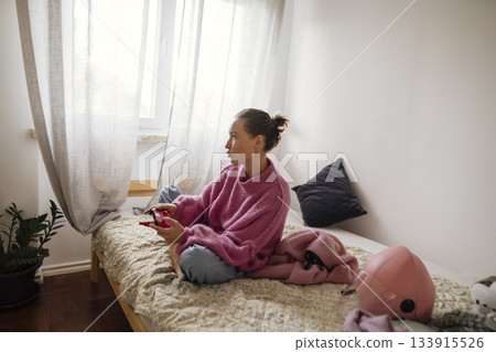 Peaceful morning reflection, Woman relaxing in gentle sunlight Peaceful morning reflection, Woman relaxing in gentle sunlight 133915526