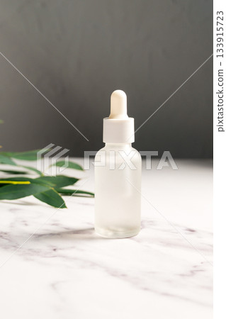 Serum, oil or collagen and peptides in transparent glass bottle. Skincare product Serum, oil or collagen and peptides in transparent glass bottle. Skincare product 133915723