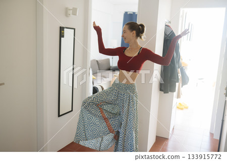 Indoor scene of woman crafting artful shadow with gestures Indoor scene of woman crafting artful shadow with gestures 133915772